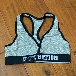 New with original packaging! Pink Nation Gray Black sports bra Small